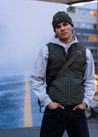 Myoko Down Vest - background::white,variant::Dark Olive